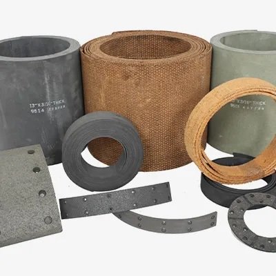 Rolls and sheets of woven, molded, and block brake lining material stocked by Friction Materials Co.